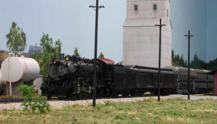 "CB&amp;Q 4960": "Mikado 4960 is shown stopping at Sheridan to allow the passengers to take photos during a run-by on a fan trip sponsored by the Illini Railroad Club. The picture recreates a scene fround in Mike Spoor's "Chicago Burlington and Quincy in Color, Volume 4."